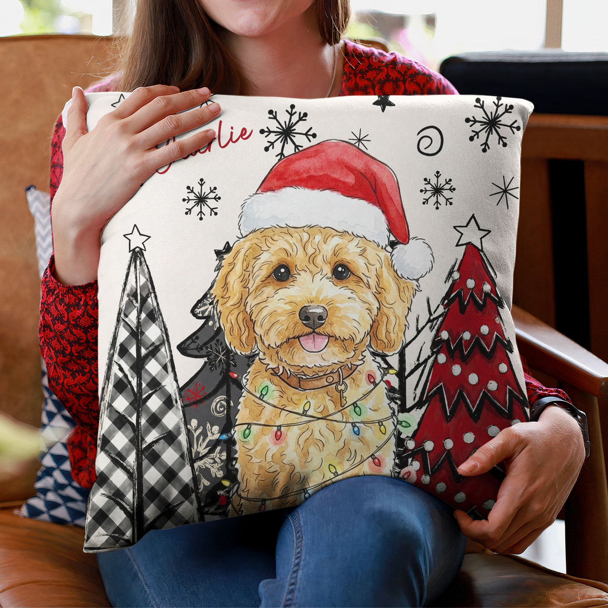 Woman holding a personalized Christmas dog portrait pillow
